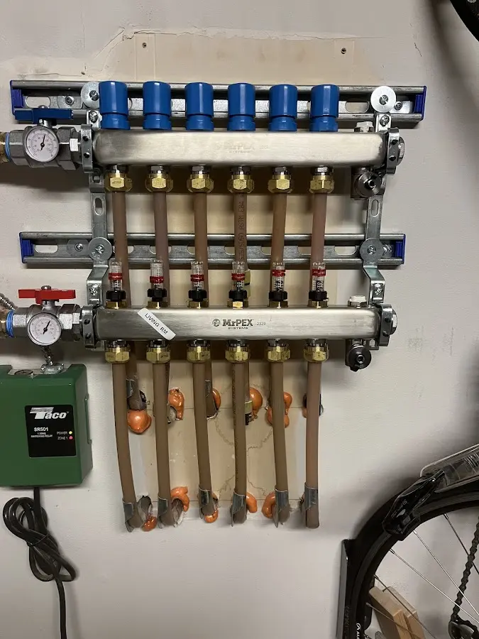 Plumber performing Water Heater Repair at a residential property in Navasota